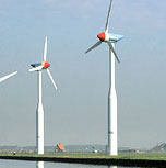 image: Electric windmills along canal